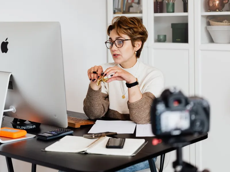 Small business owner in Red Deer managing digital marketing from a home office